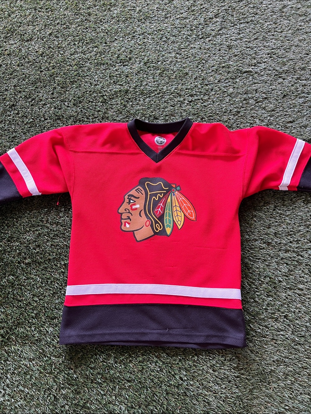 NHL Red Kids Hockey Jersey with Black & White Trim and Team Crest